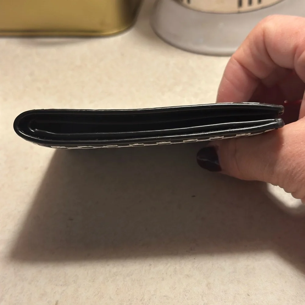 Michael Kors Cooper bilfold bifold wallet. Black and white. Used, mild wear